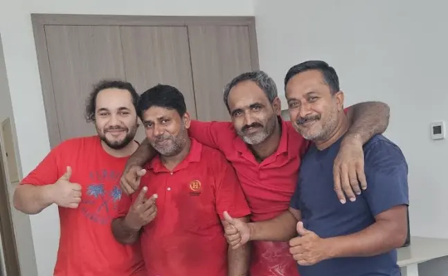 The Al Rohan moving crew giving a thumbs up after a move